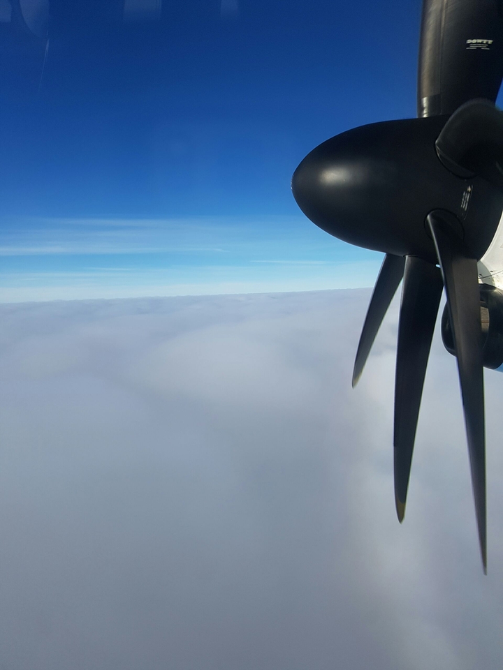 clouds and a plane propeller