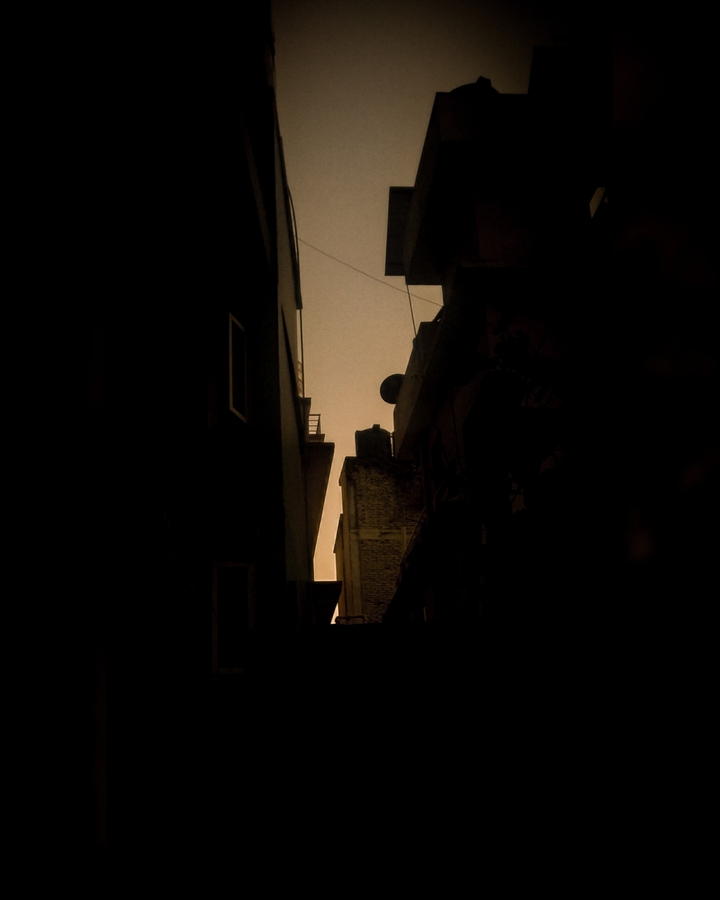 Sunset through buildings