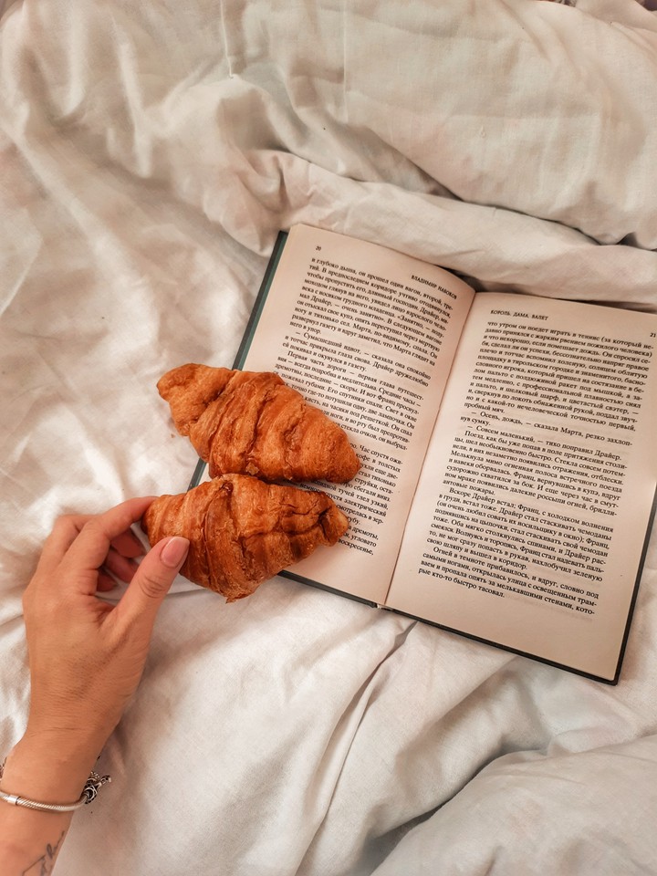 book and croissant