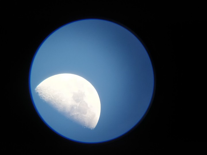 Half moon in telescope