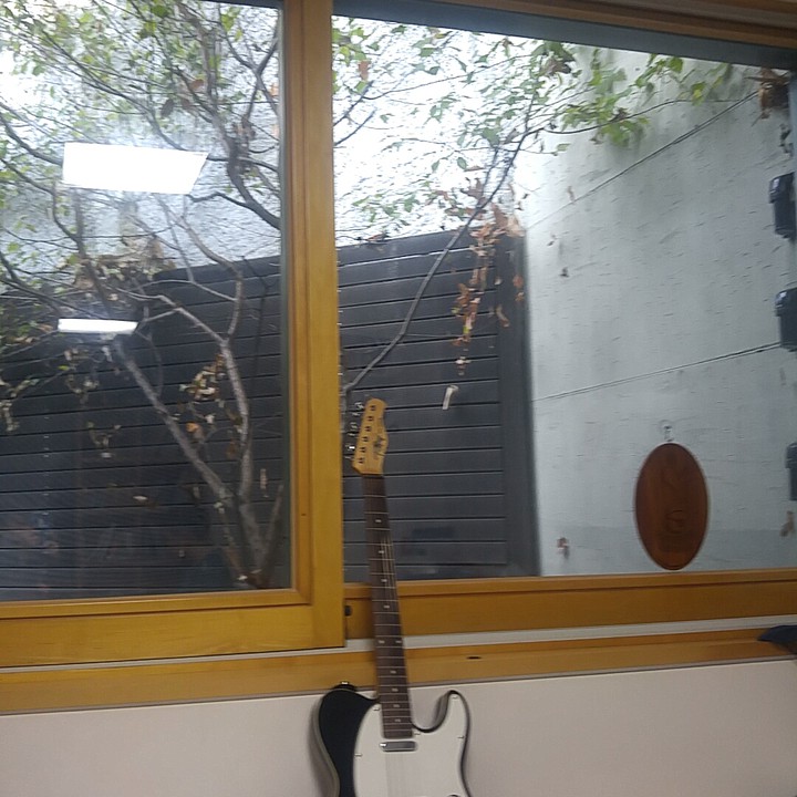 guitar in a big room