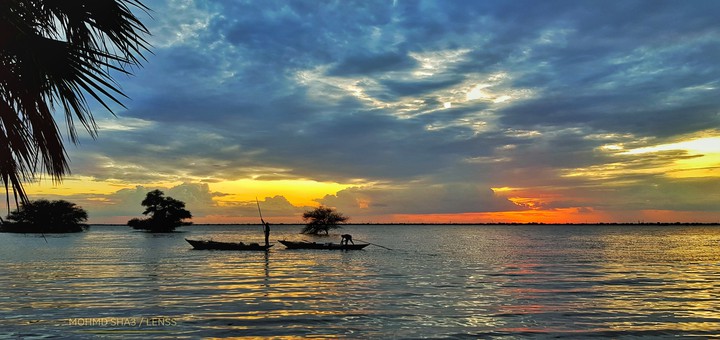 sunset on Nile and the  Fisher