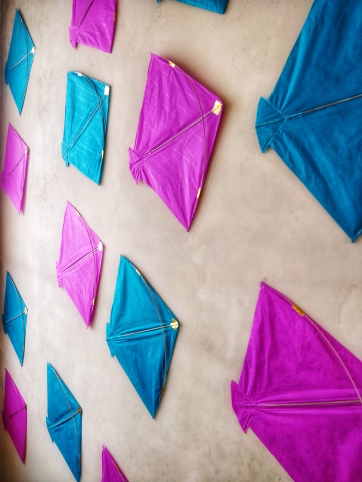 colourful kites on the wall