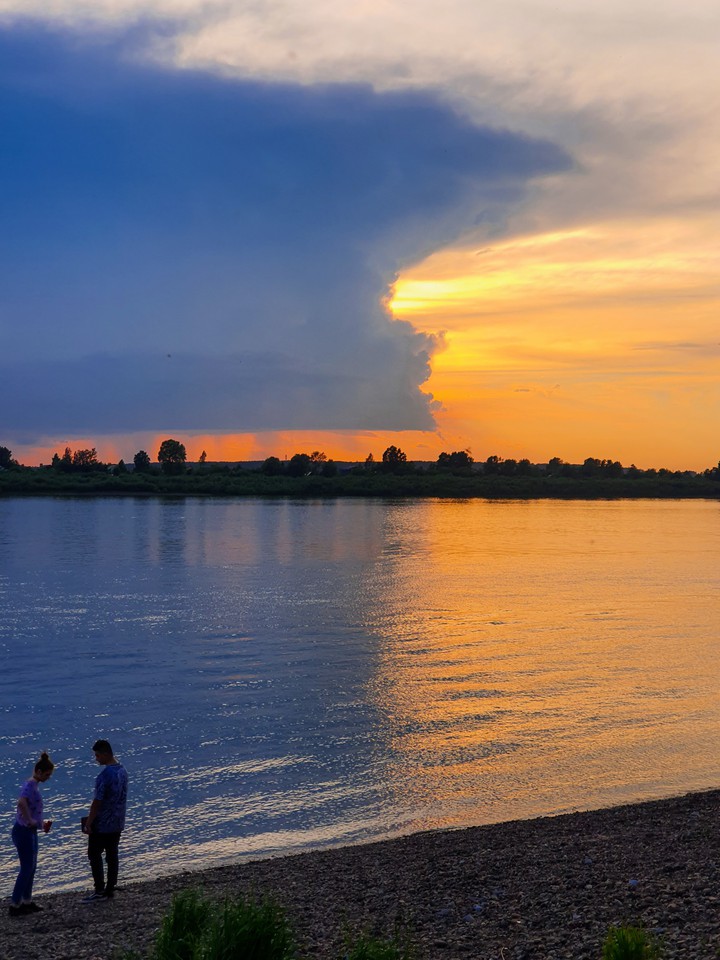 a couple enjoying the sunset ?