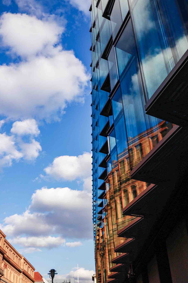 Reflection of the sky in a glass building