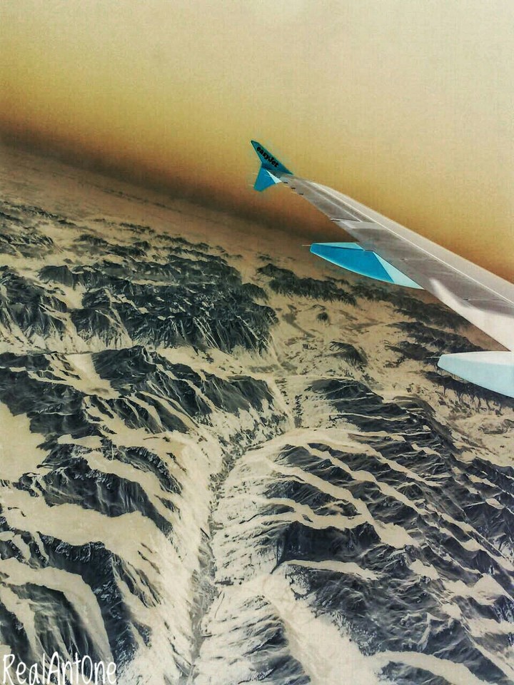 sky , plane , mountains