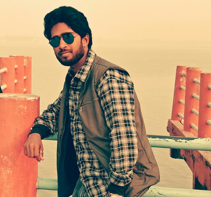 R KHAN