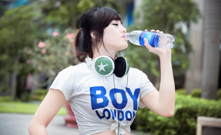 Young Girl Drinking Water