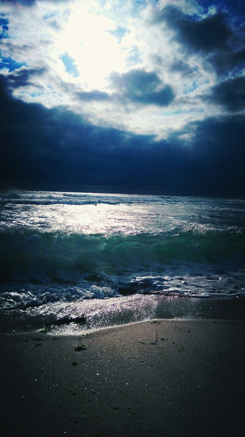 Dark sky over sea.