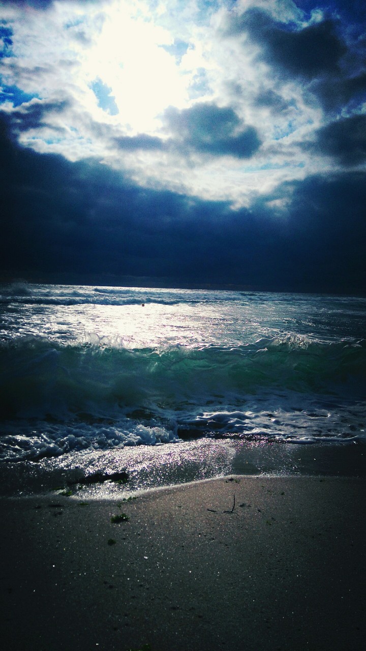 Dark sky over sea.