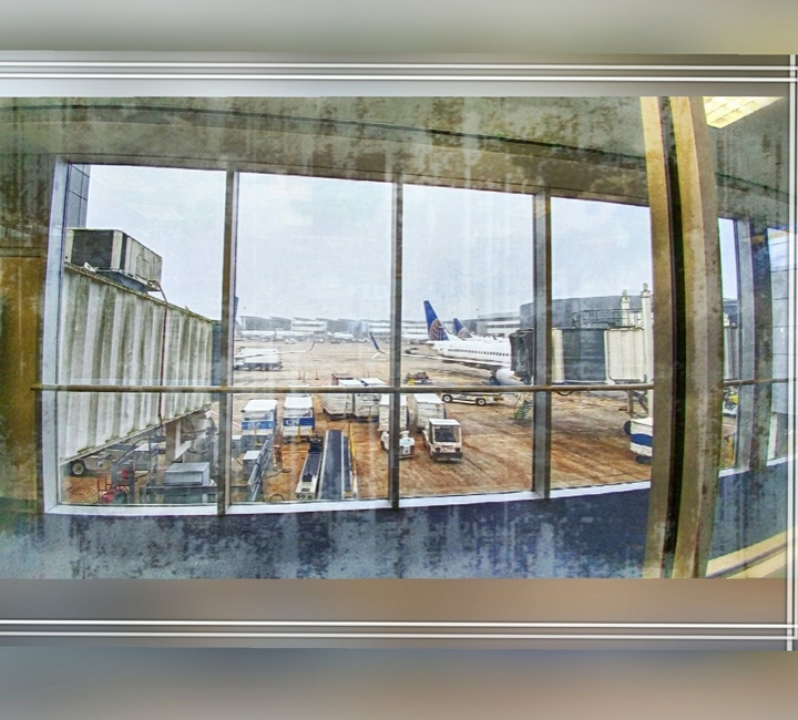 Picture by Airport Window with digital frame and filler