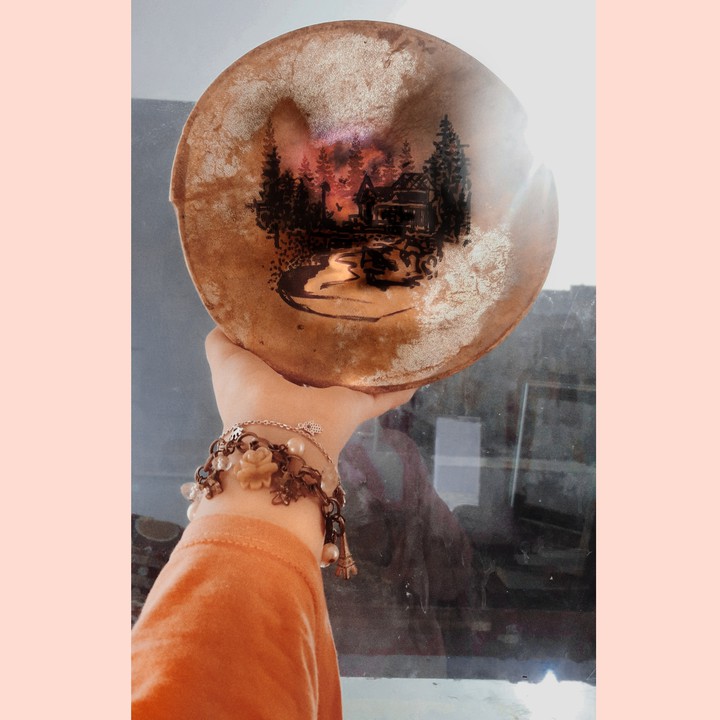 quick drawing on tambourine