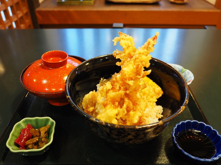 Bowl of rice and fried fish