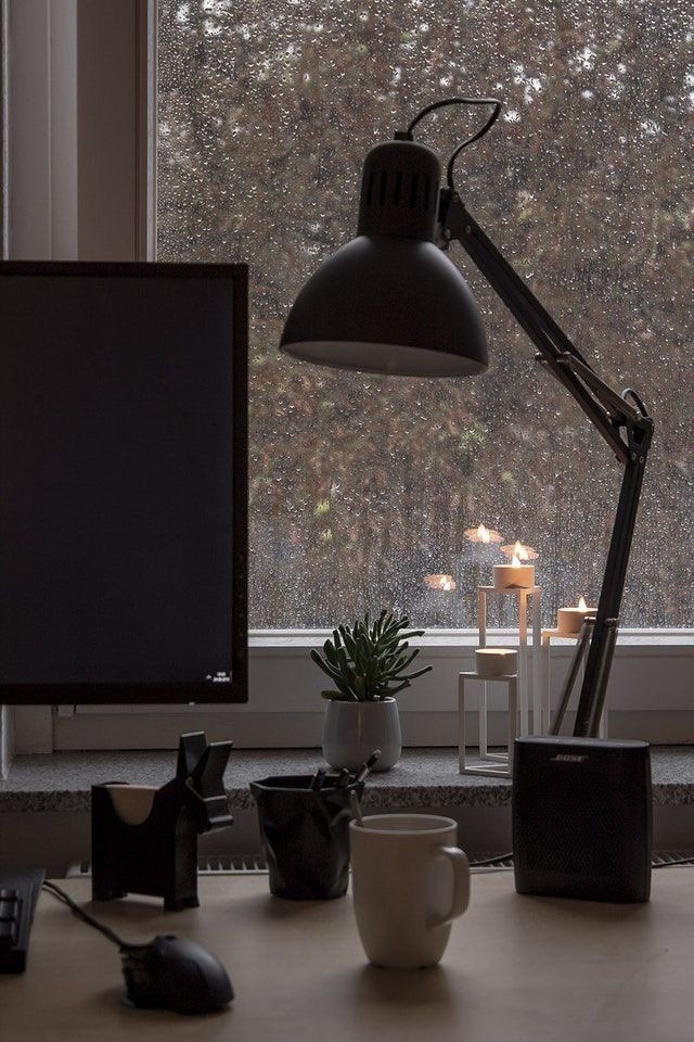 I check my students ' homework in a cozy atmosphere