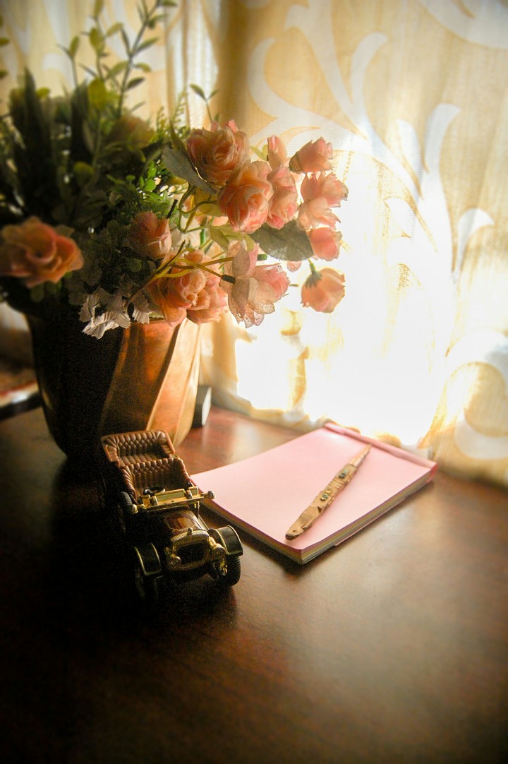 Soft glow of roses.