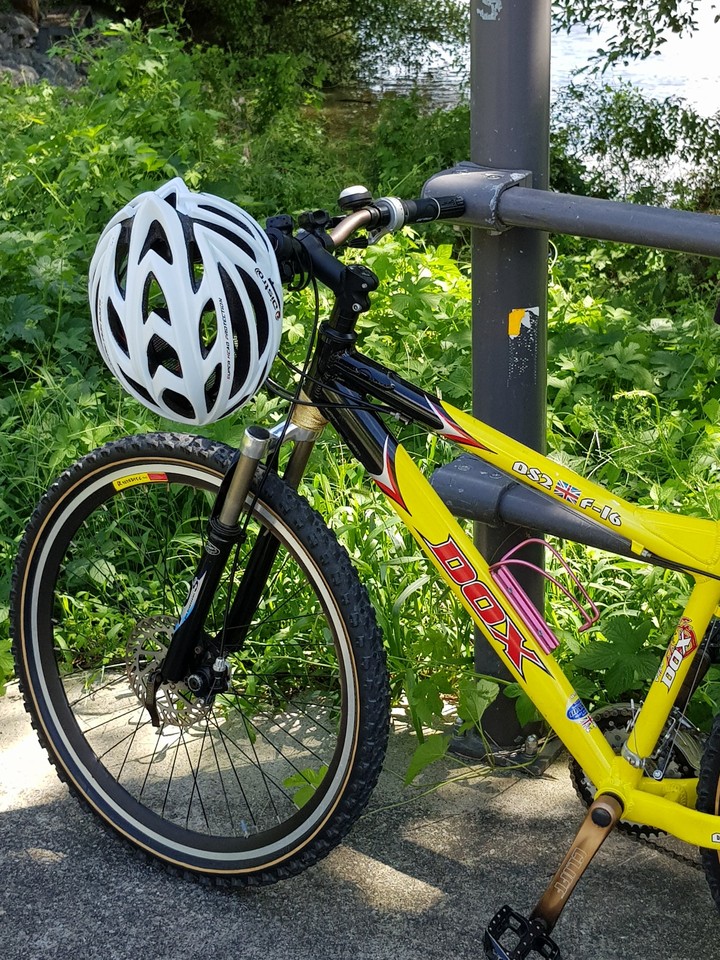 In late summer bicycle riding road ...