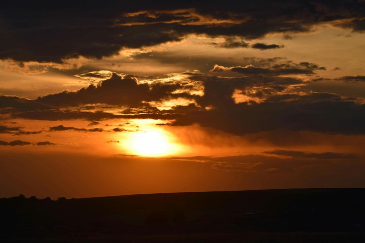 melting sun. golden clouds. no edit
