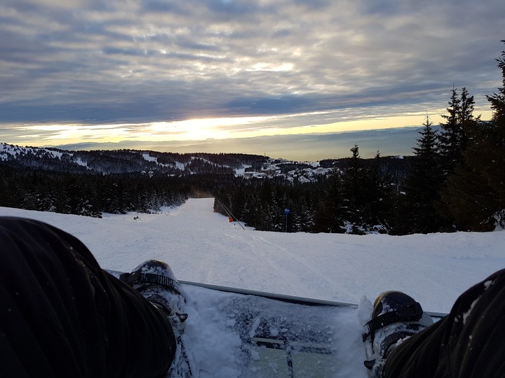 sunset snowboarding