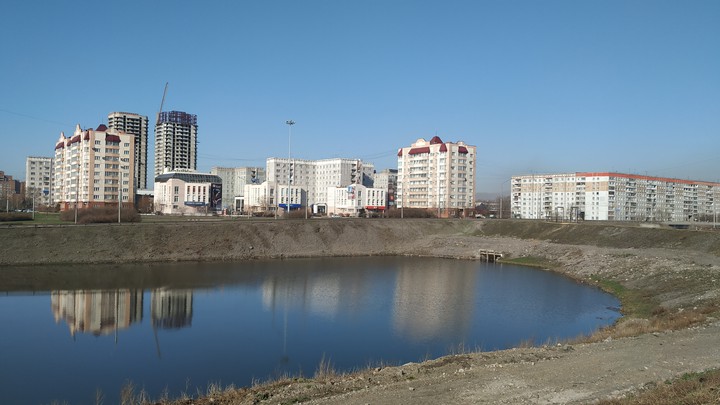 Город