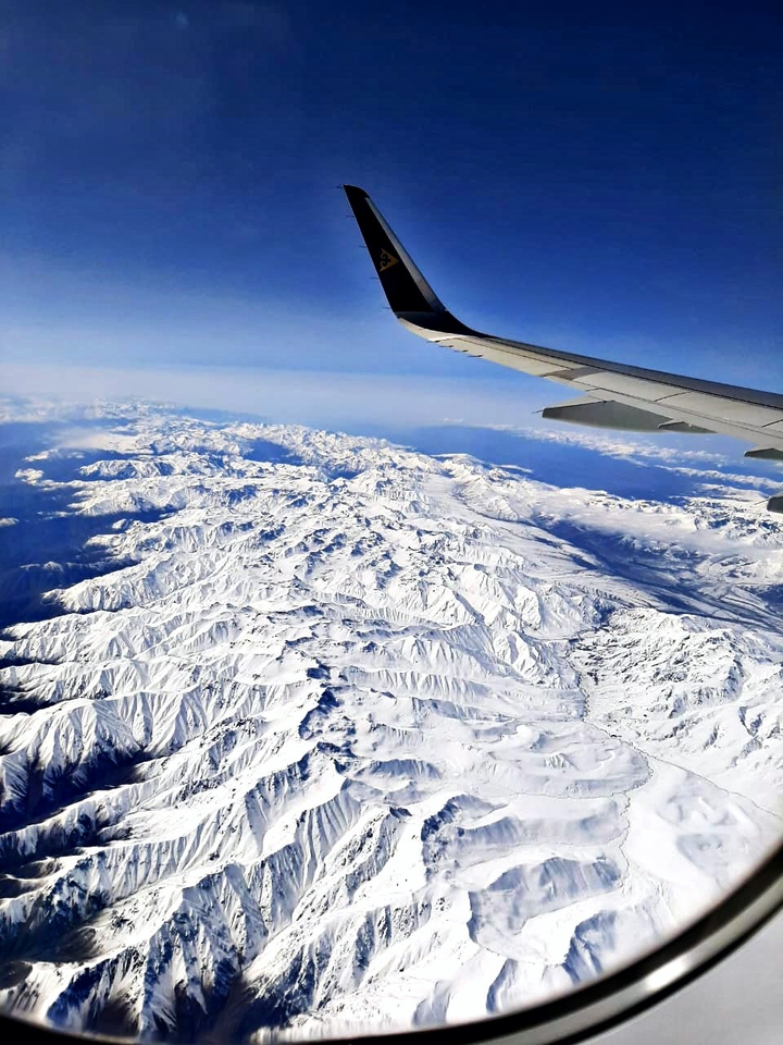 fly high above the mountains
