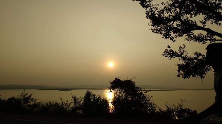 Looks like sun is going for a stroll by the river