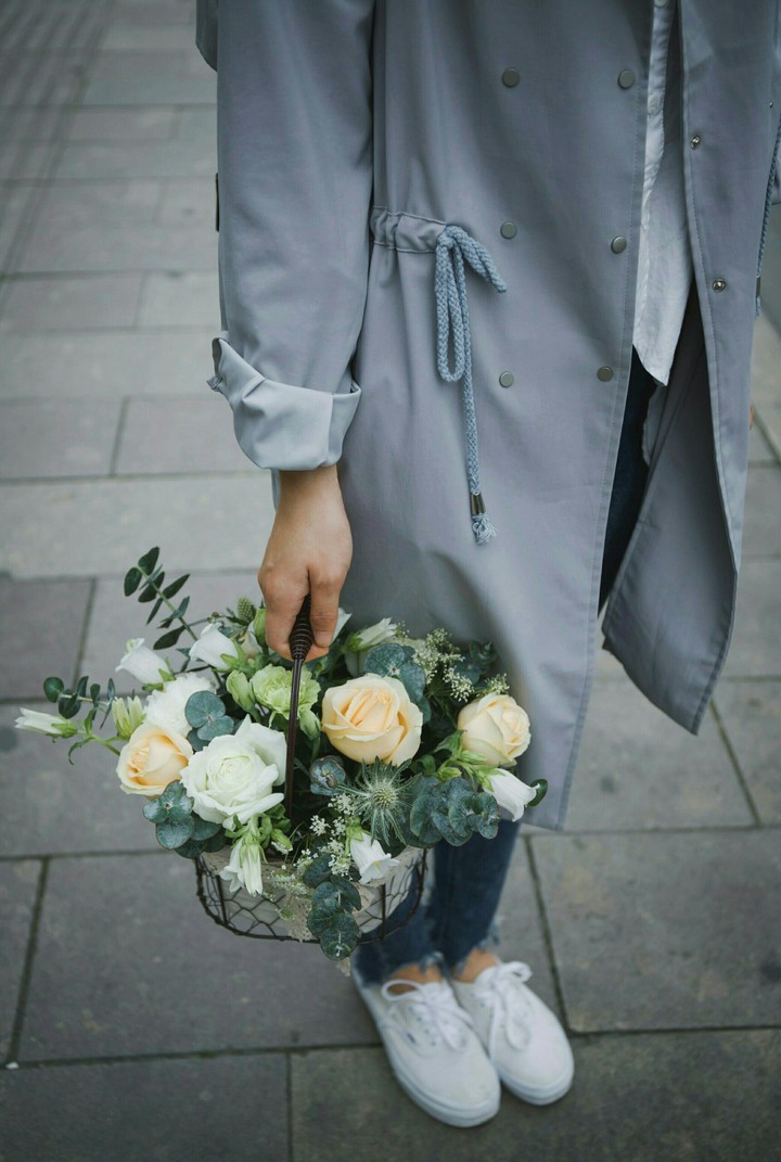 holding flowers