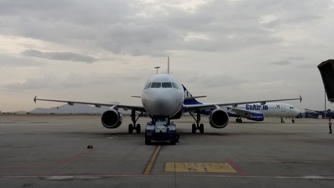 Airplane on push back