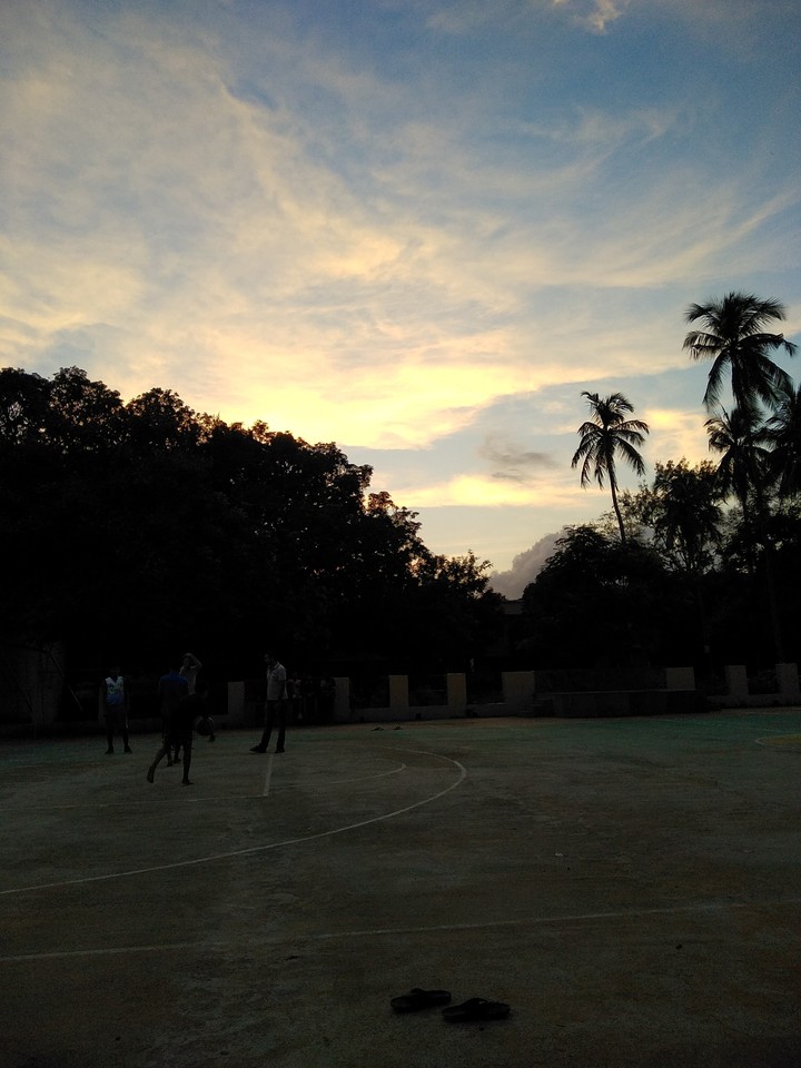 Sun Set And Rainy Cloud in College Ground