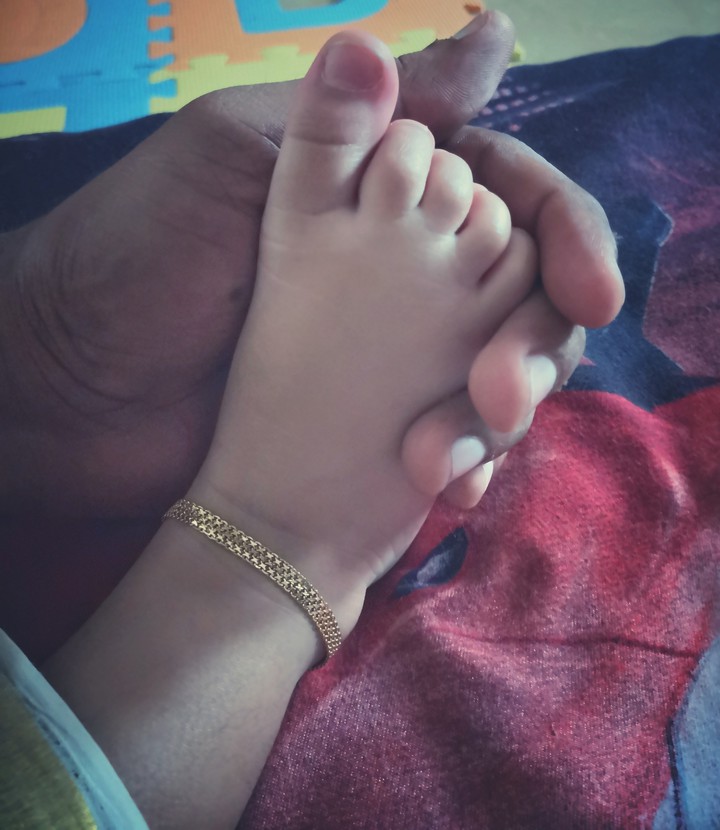 Baby leg in palm