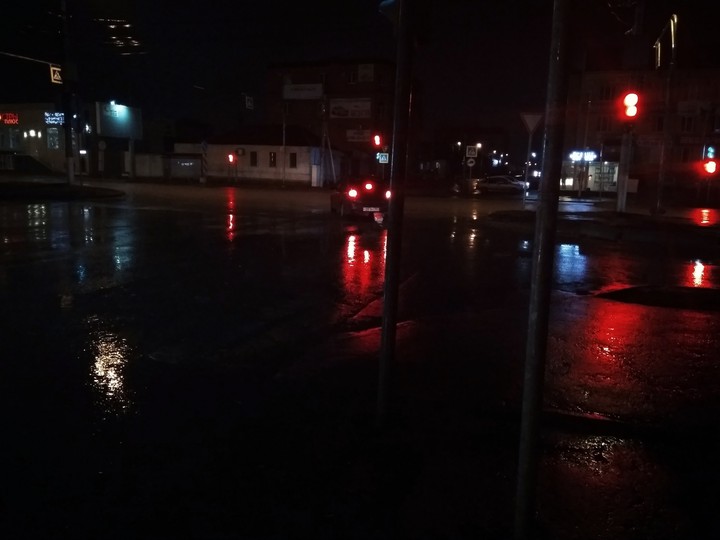 The night road after rain with lights