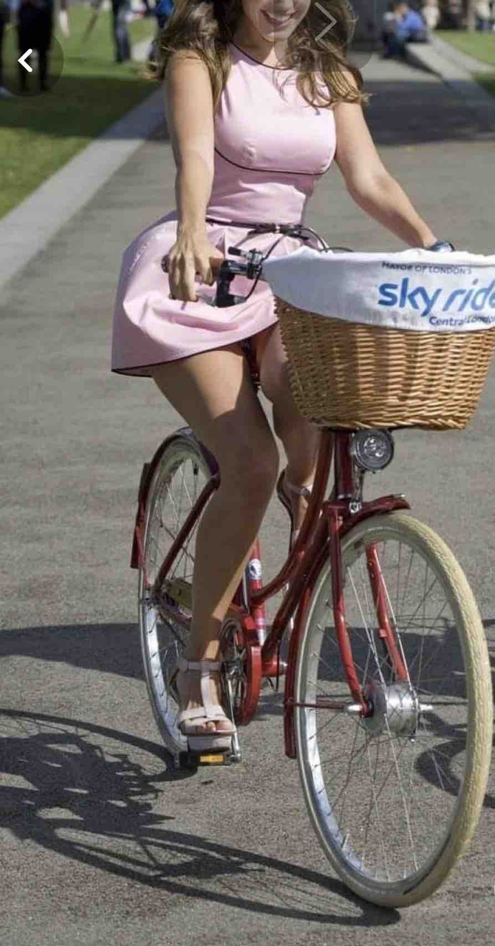 lady riding on bike ?