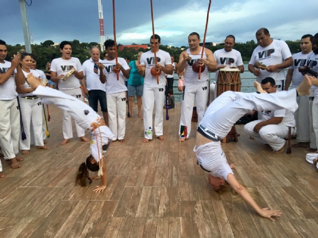 Capoeira mixes martial art, sport and music. Afro-brazilian