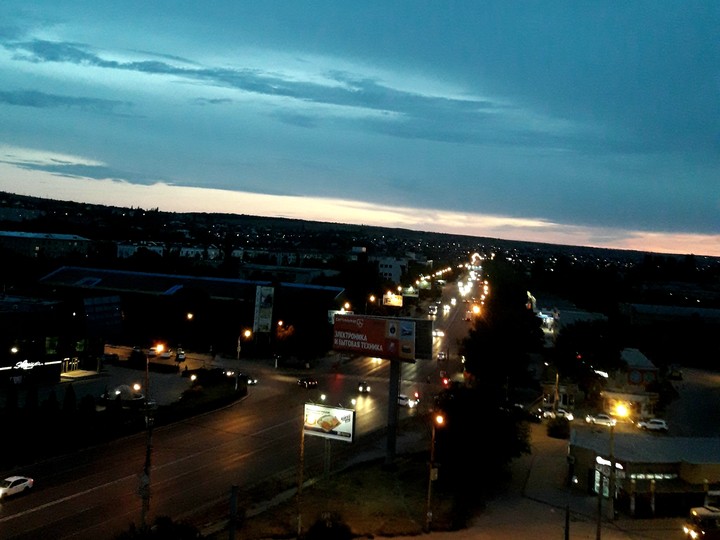 город