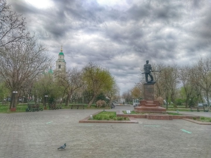 город
