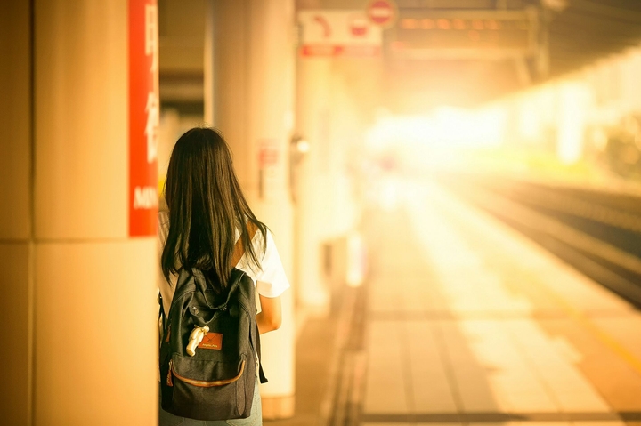 girl waiting for train