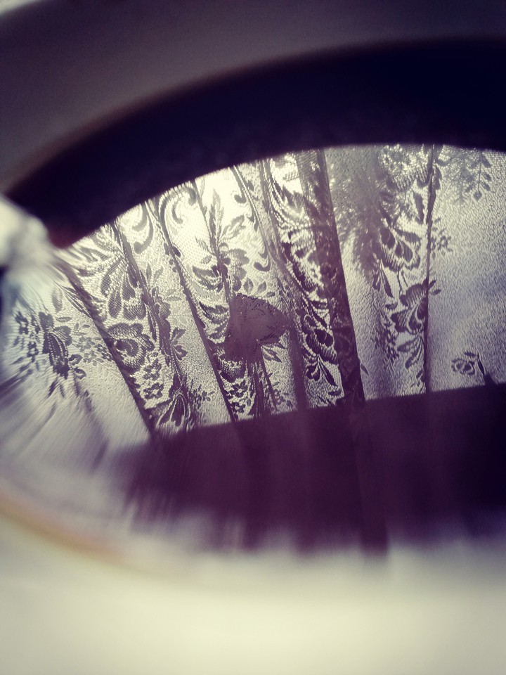 reflection in a cup of coffee