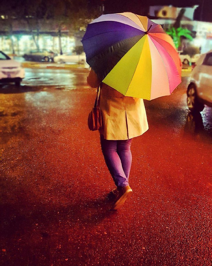 under the rain with colorful umbrella☔☂
