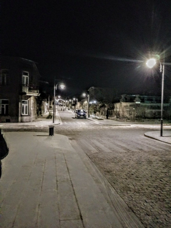 город
