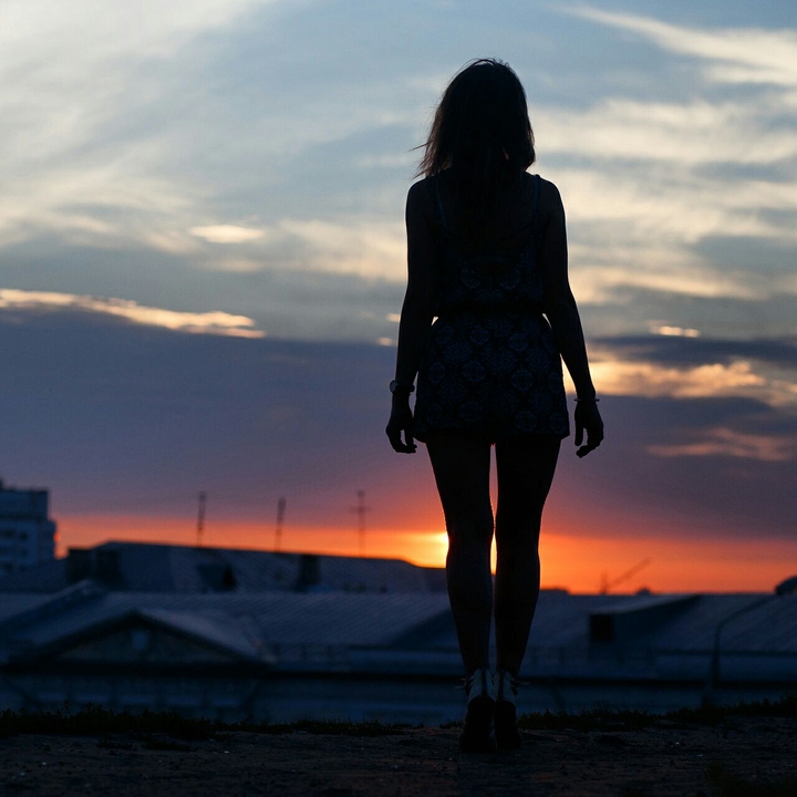 Girl. Sunset. Town.