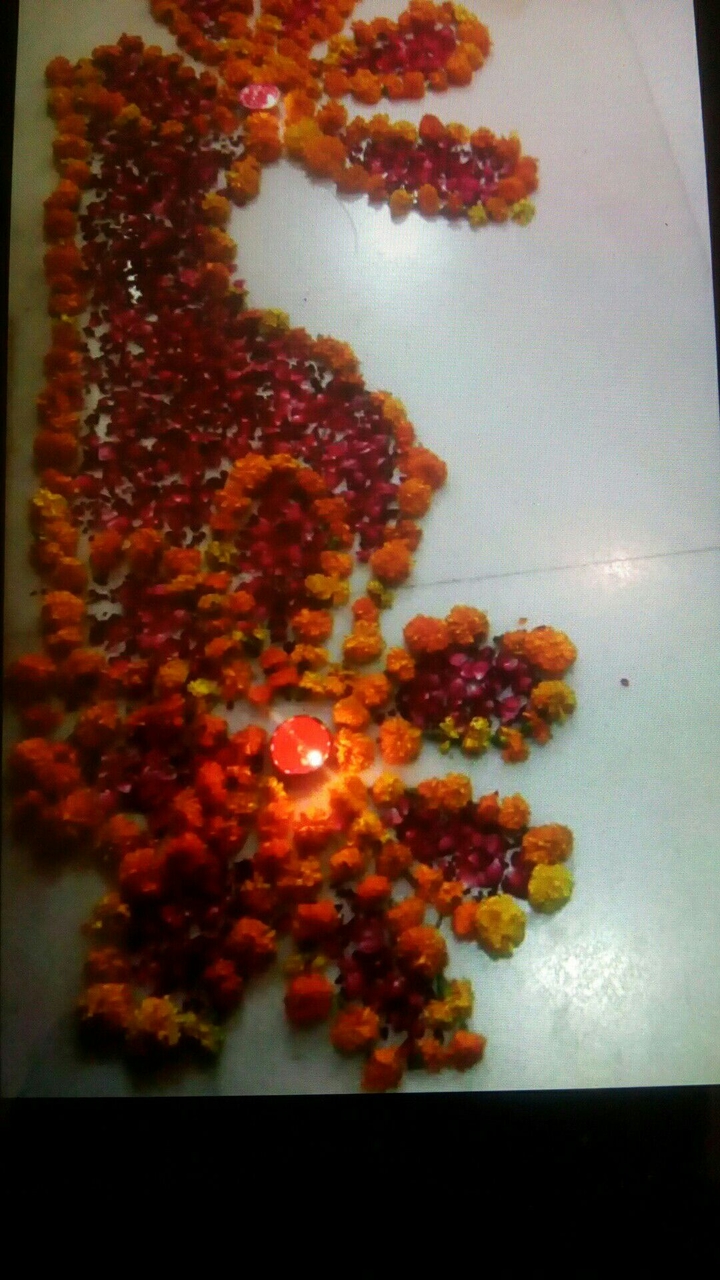 Flower Rangoli with diya