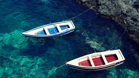 Boats and Crystal Sea