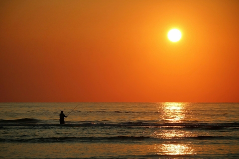 fisherman at sunrise