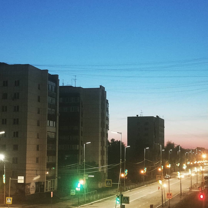 город