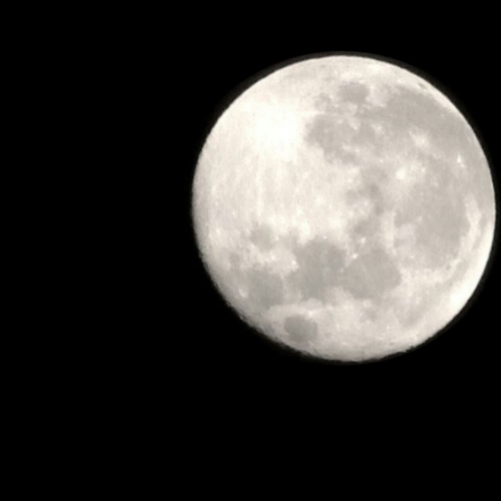 white moon , black sky