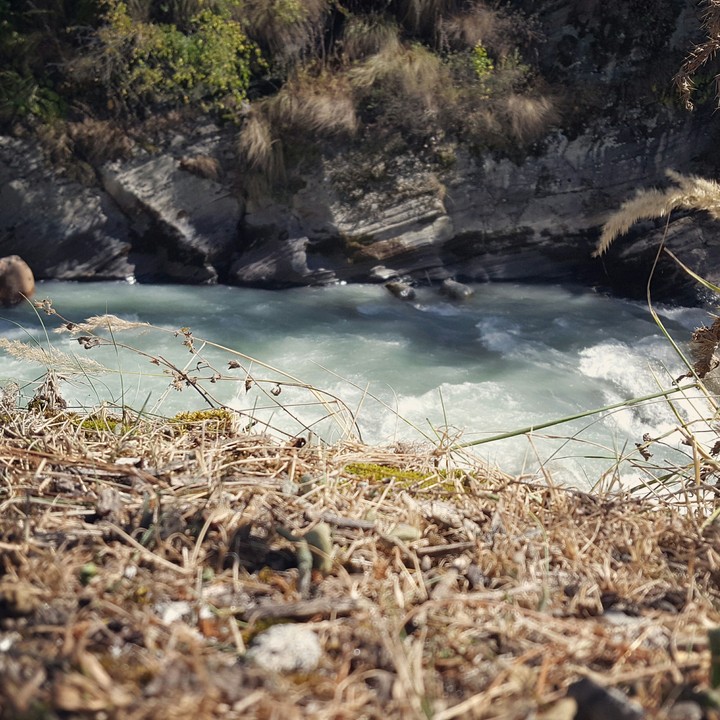 water gushing down from a mountain