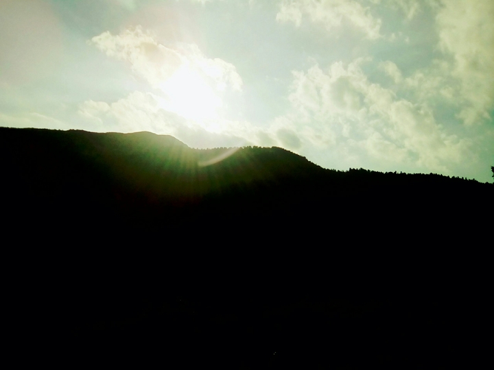 Mountain and sun