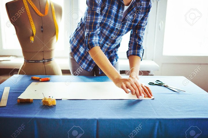 tailor cutting me