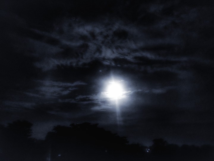 Moon in Cloudy Sky