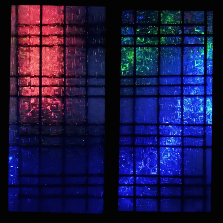 glimpse of tiny light bulbs on window creating aurora effect