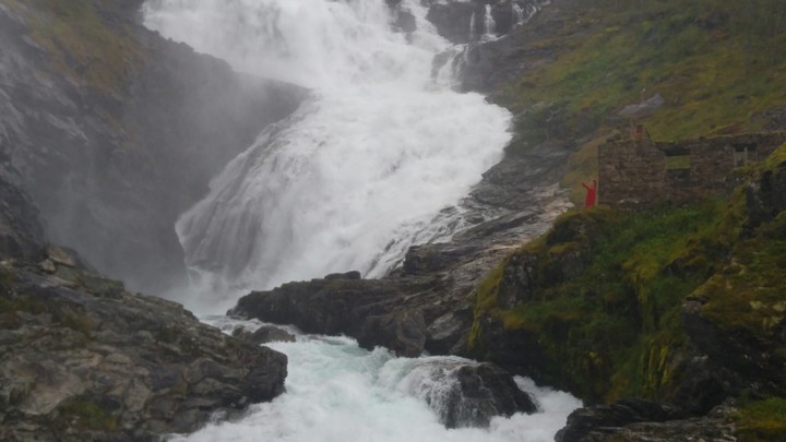 A woman dancing . . . waterfall